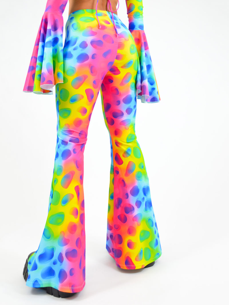 Flared Trousers with Scrunch Bum in Rainbow Cow Print